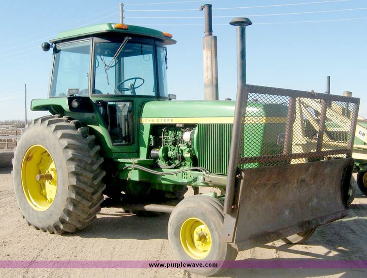 image for item 6540 1977 John Deere 4430 tractor with 8' dozer blade
