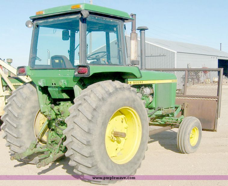 image for item 6540 1977 John Deere 4430 tractor with 8' dozer blade