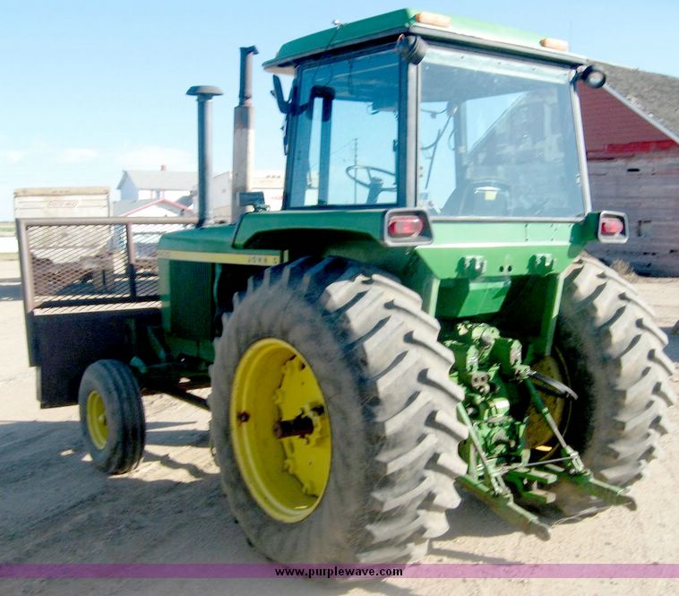 image for item 6540 1977 John Deere 4430 tractor with 8' dozer blade