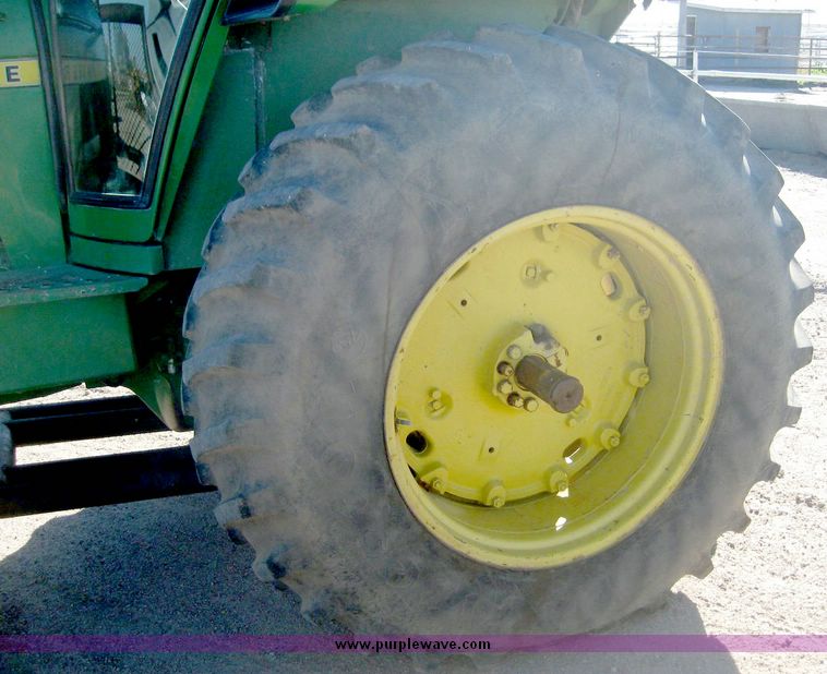 image for item 6540 1977 John Deere 4430 tractor with 8' dozer blade