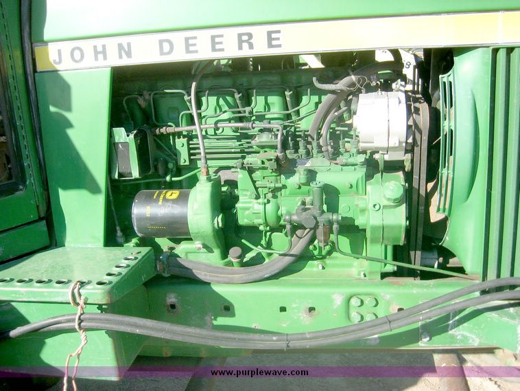 image for item 6540 1977 John Deere 4430 tractor with 8' dozer blade