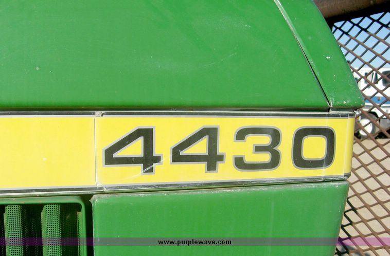 image for item 6540 1977 John Deere 4430 tractor with 8' dozer blade