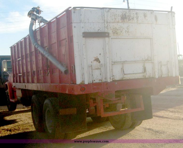 image for item 6551 1974 Chevrolet C65 tandem axle grain truck with 22' bed and hoist