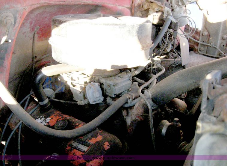 image for item 6551 1974 Chevrolet C65 tandem axle grain truck with 22' bed and hoist