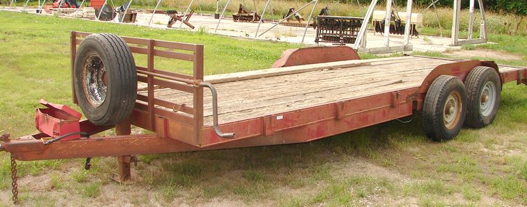 image for item 5896 1988 24' flatbed trailer with removable side racks and ramps