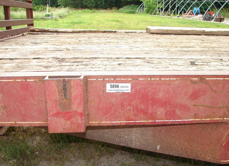 image for item 5896 1988 24' flatbed trailer with removable side racks and ramps