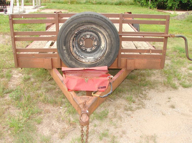 image for item 5896 1988 24' flatbed trailer with removable side racks and ramps