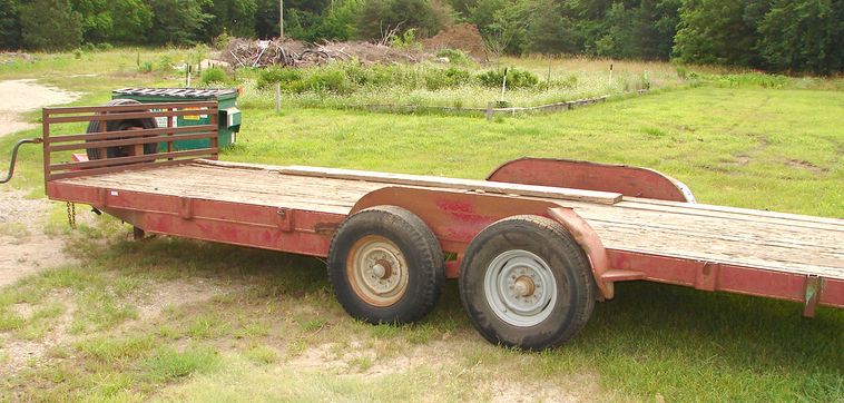image for item 5896 1988 24' flatbed trailer with removable side racks and ramps