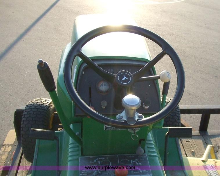 image for item 6544 John Deere 214 riding lawn mower with attachments
