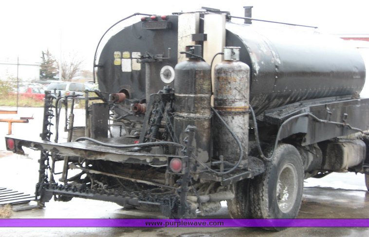 image for item 1502 1985 International Cargostar 1854 etnyre oil distributor truck