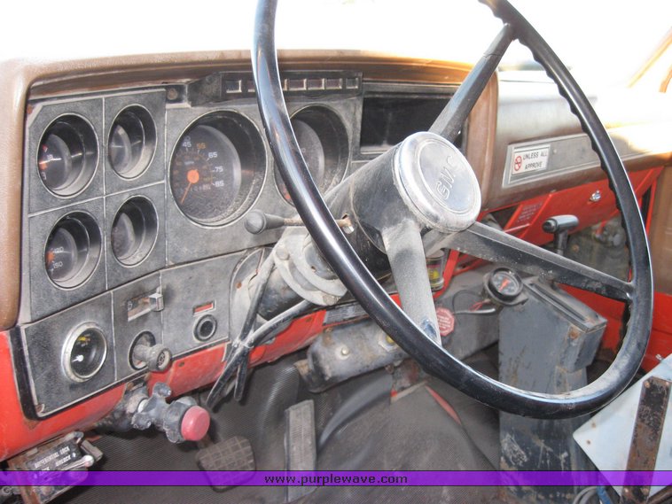 image for item 3051 1988 GMC Topkick ME6500 C7D064 tandem axle dump truck with 12' Doonan bed