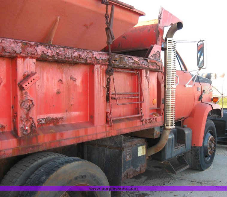 image for item 3051 1988 GMC Topkick ME6500 C7D064 tandem axle dump truck with 12' Doonan bed