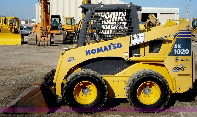 image for item 4210 2003 Komatsu SK 1020 skid steer