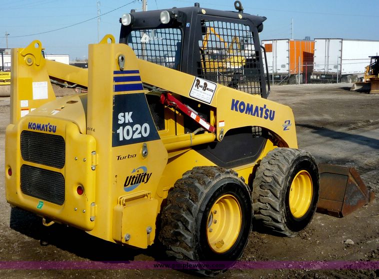 image for item 4210 2003 Komatsu SK 1020 skid steer