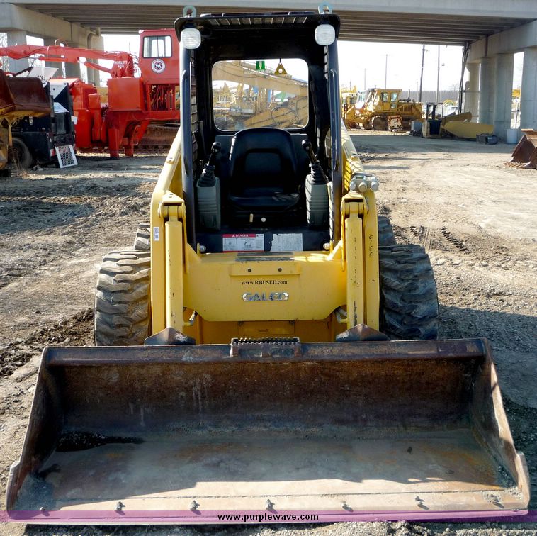 image for item 4210 2003 Komatsu SK 1020 skid steer