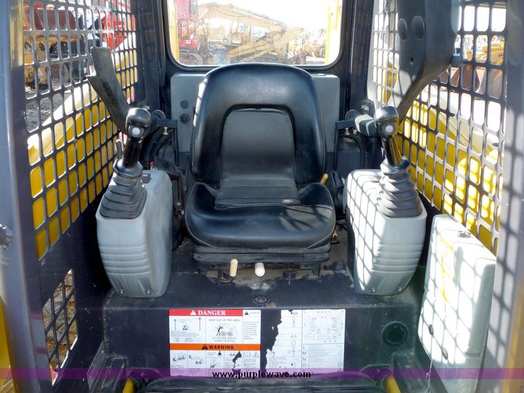 image for item 4210 2003 Komatsu SK 1020 skid steer