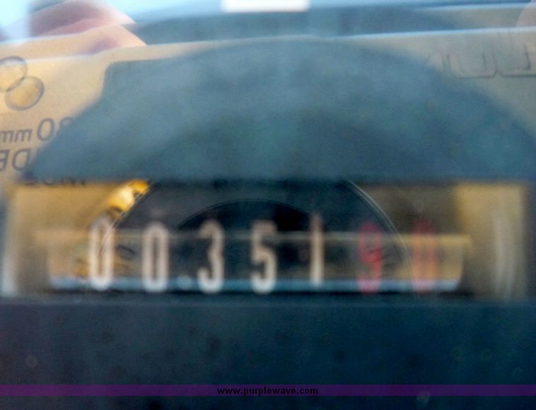 image for item 4210 2003 Komatsu SK 1020 skid steer