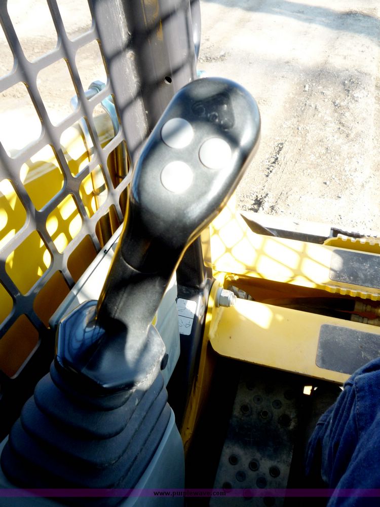 image for item 4210 2003 Komatsu SK 1020 skid steer