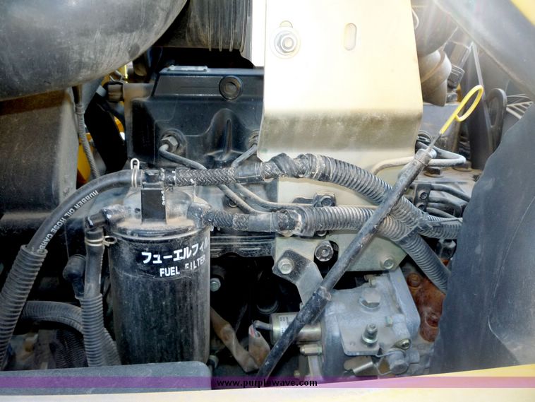 image for item 4210 2003 Komatsu SK 1020 skid steer