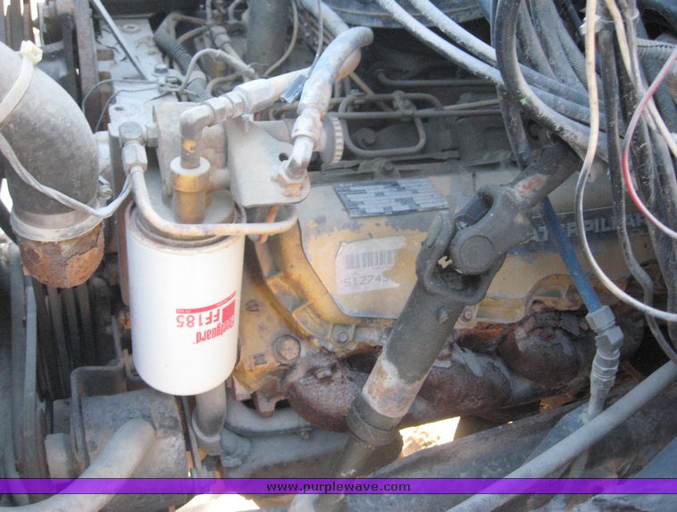 image for item 6419 1988 GMC Topkick ME6500 C7D064 tandem axle truck with 12' Doonan dump bed