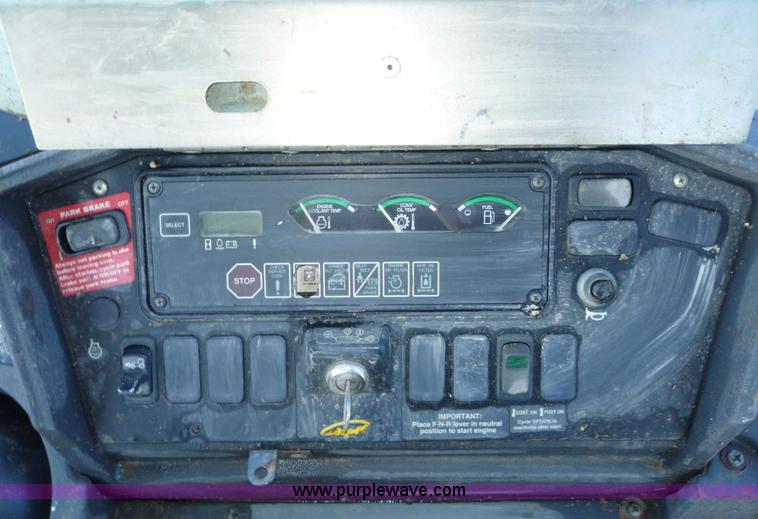 image for item 4250 2005 John Deere 310G MFWD loader backhoe