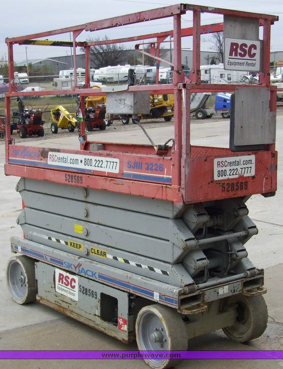 image for item 5007 2004 Skyjack SJ III 3226 scissor lift