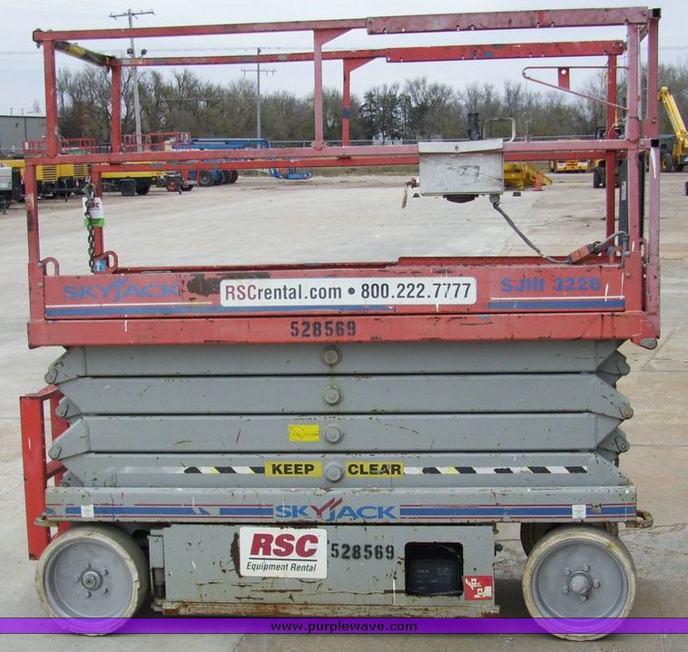 image for item 5007 2004 Skyjack SJ III 3226 scissor lift
