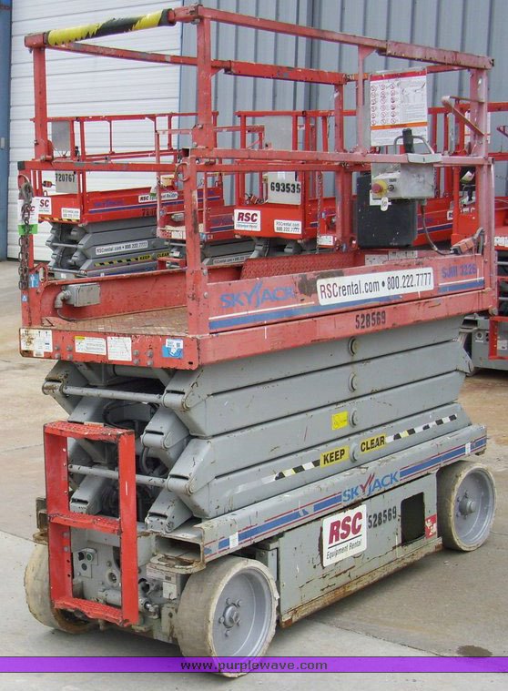 image for item 5007 2004 Skyjack SJ III 3226 scissor lift
