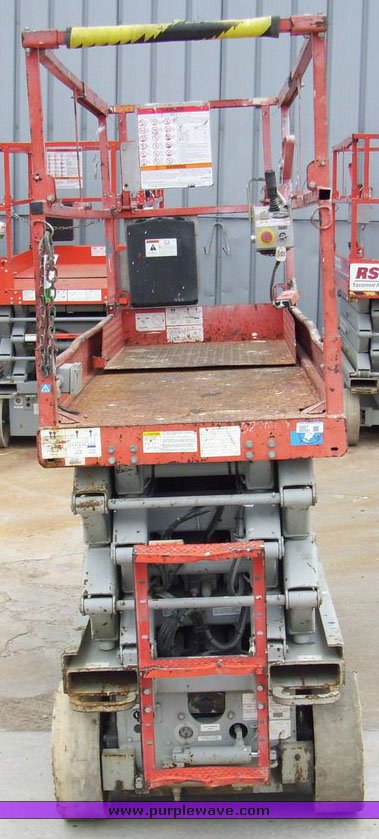 image for item 5007 2004 Skyjack SJ III 3226 scissor lift