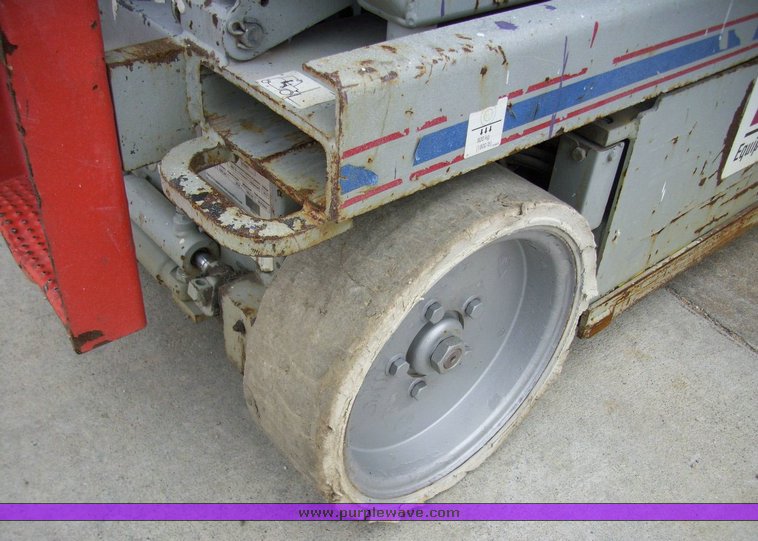 image for item 5007 2004 Skyjack SJ III 3226 scissor lift