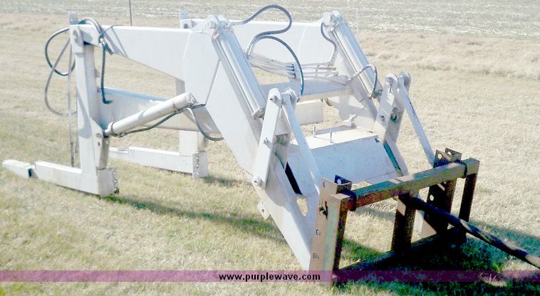image for item 3056 Schvartz loader with bale spear
