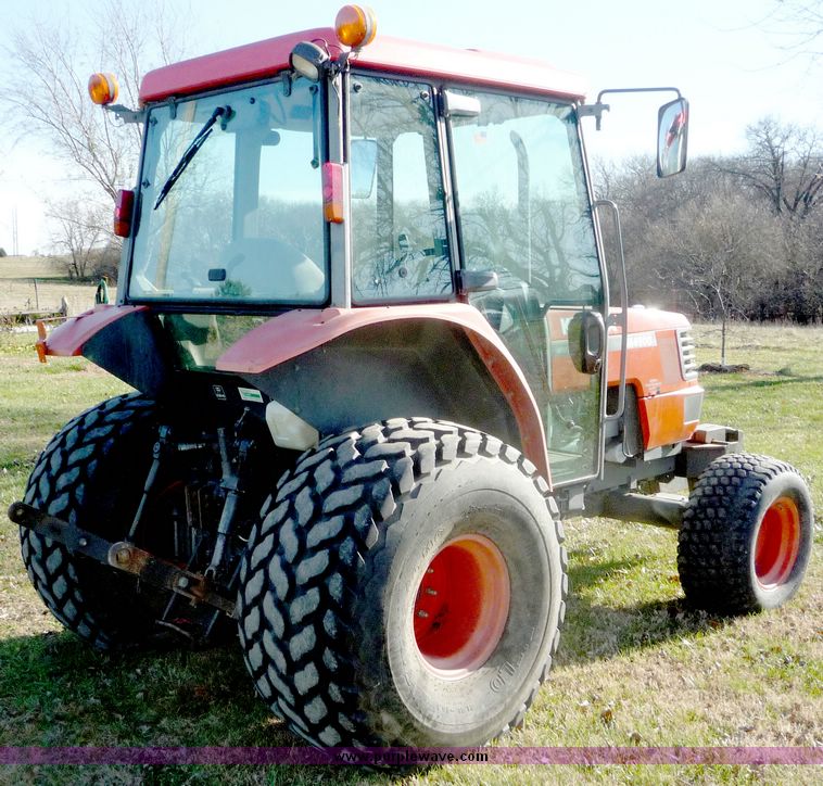 2000 Kubota M4900 MFWD utility tractor in Lawrence, KS | Item 5062 sold