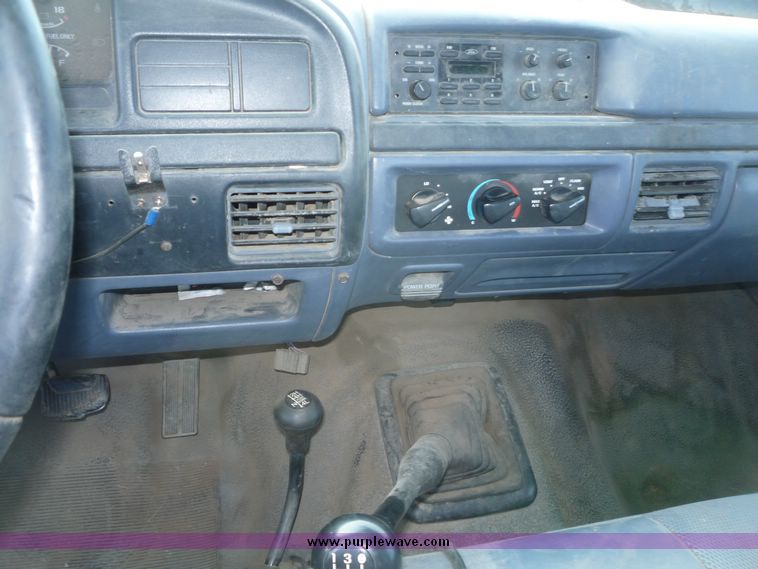 image for item 5124 1992 Ford F-250 extended cab pickup with flatbed and bale spike