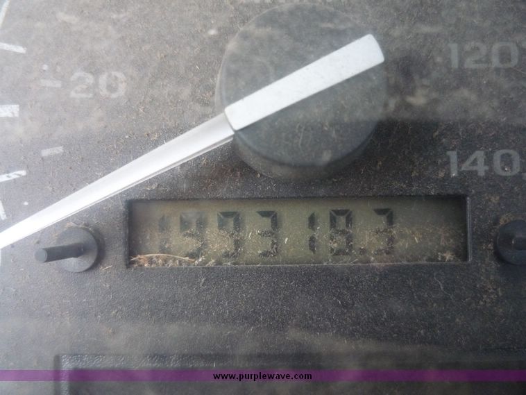 image for item 5124 1992 Ford F-250 extended cab pickup with flatbed and bale spike