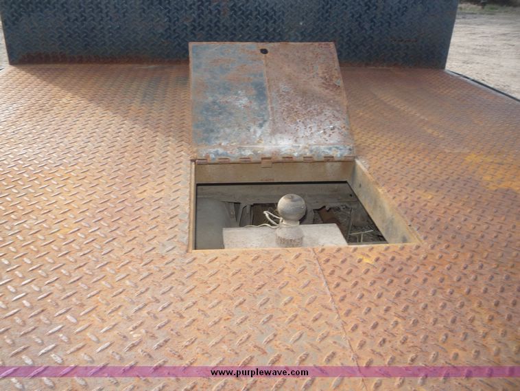 image for item 5124 1992 Ford F-250 extended cab pickup with flatbed and bale spike