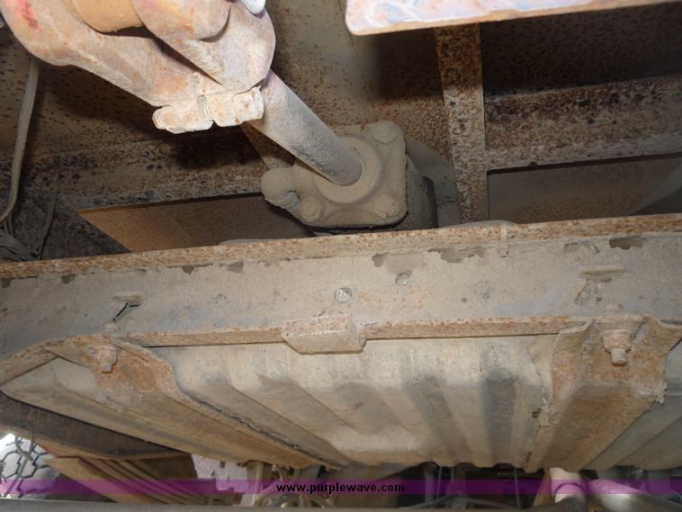 image for item 5124 1992 Ford F-250 extended cab pickup with flatbed and bale spike