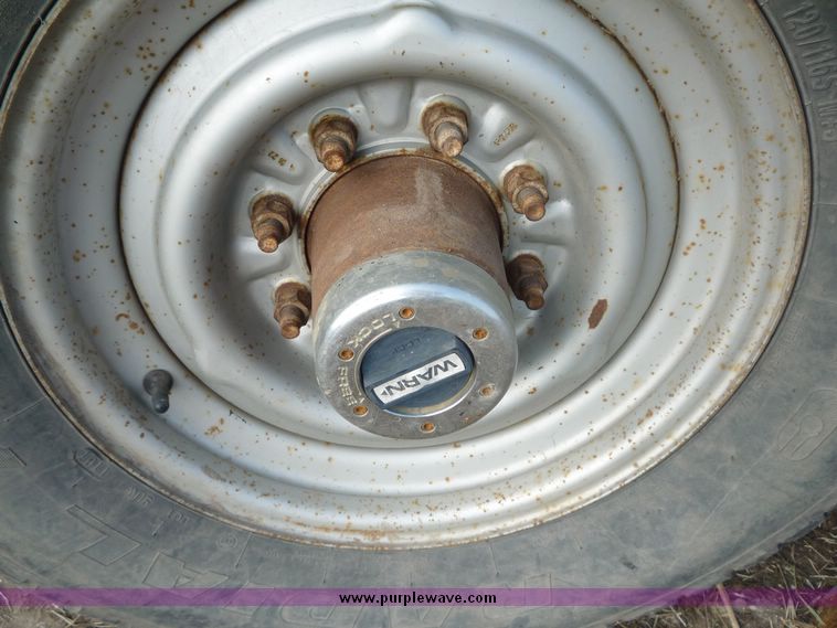 image for item 5124 1992 Ford F-250 extended cab pickup with flatbed and bale spike