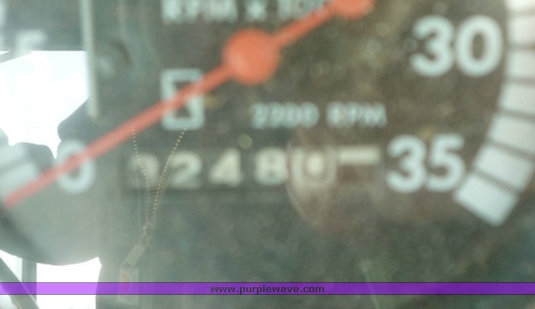 image for item 5134 1973 John Deere 7700 combine with 222 John Deere 22' rigid platform with bat reel