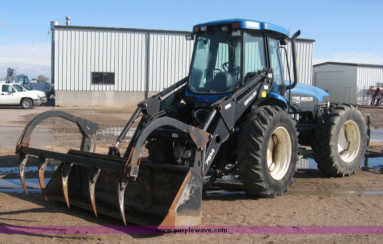 image for item 6611 1998 New Holland TV140 bi-directional 4WD tractor