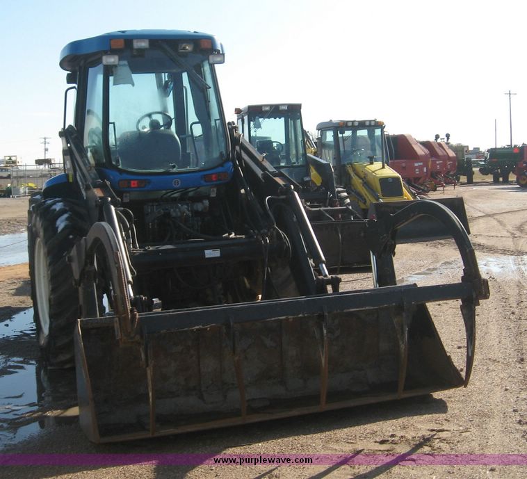 image for item 6611 1998 New Holland TV140 bi-directional 4WD tractor