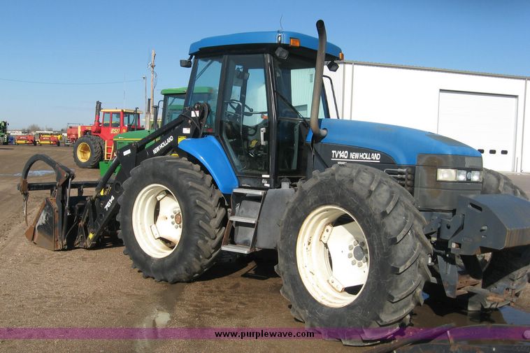 image for item 6611 1998 New Holland TV140 bi-directional 4WD tractor