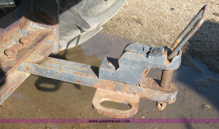 image for item 6611 1998 New Holland TV140 bi-directional 4WD tractor