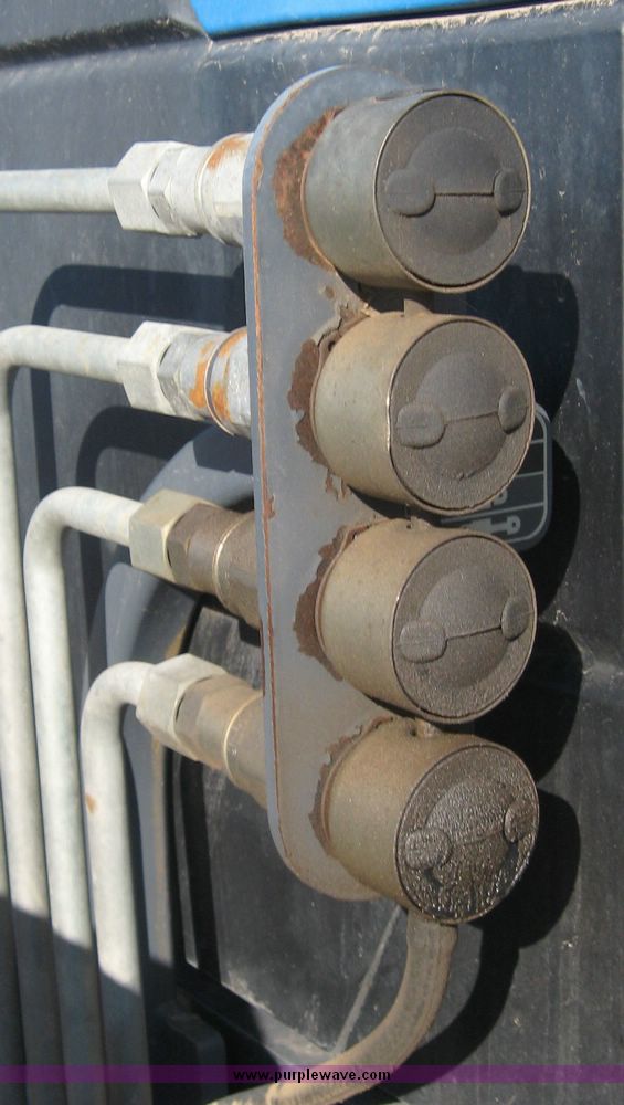 image for item 6611 1998 New Holland TV140 bi-directional 4WD tractor