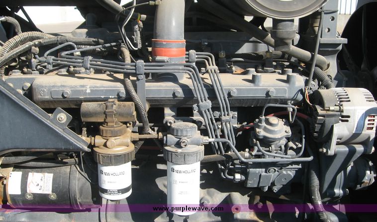 image for item 6611 1998 New Holland TV140 bi-directional 4WD tractor