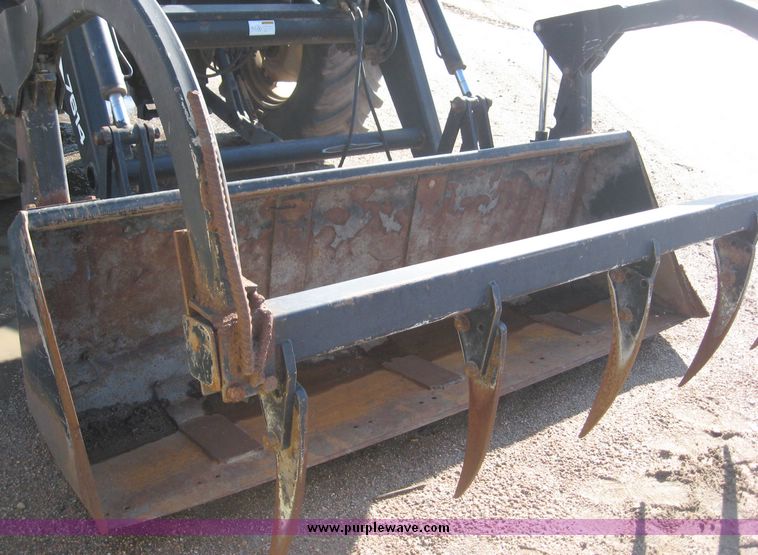 image for item 6611 1998 New Holland TV140 bi-directional 4WD tractor