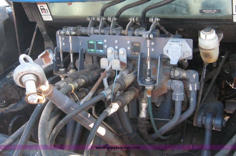 image for item 6611 1998 New Holland TV140 bi-directional 4WD tractor