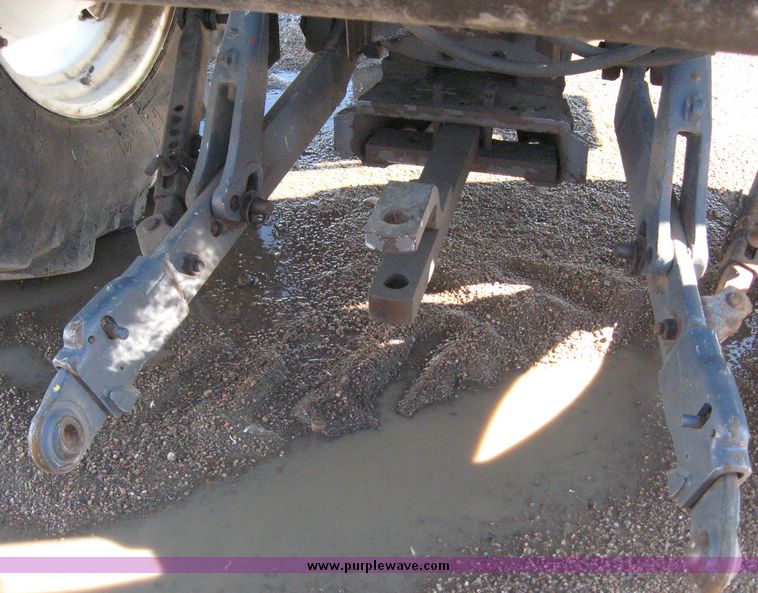 image for item 6611 1998 New Holland TV140 bi-directional 4WD tractor