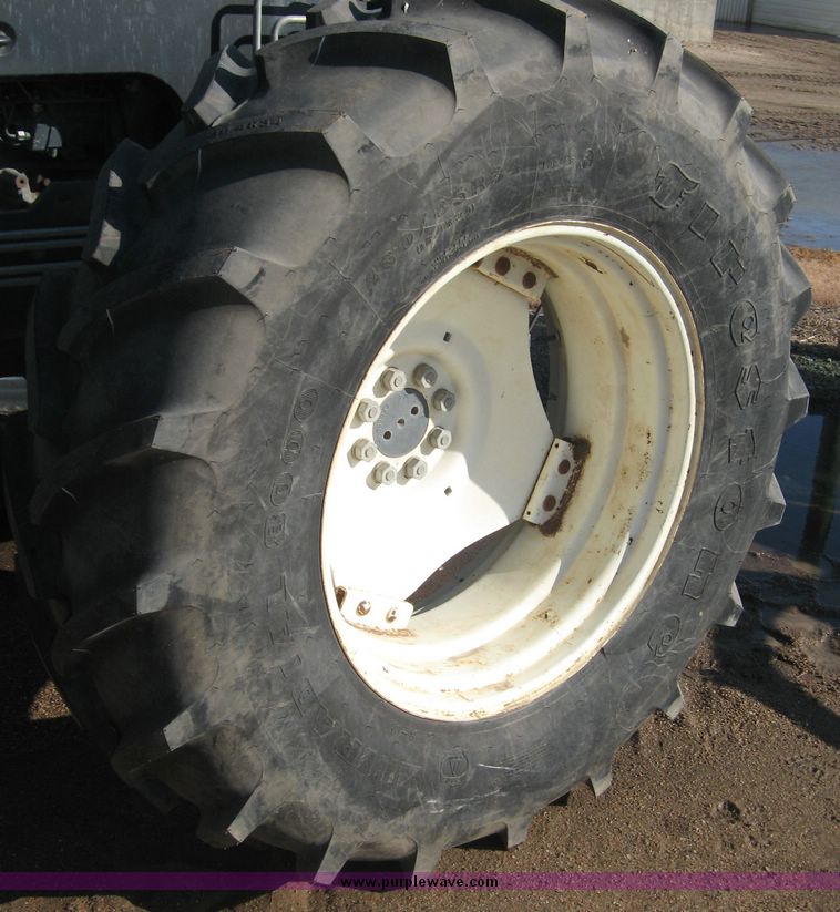 image for item 6611 1998 New Holland TV140 bi-directional 4WD tractor