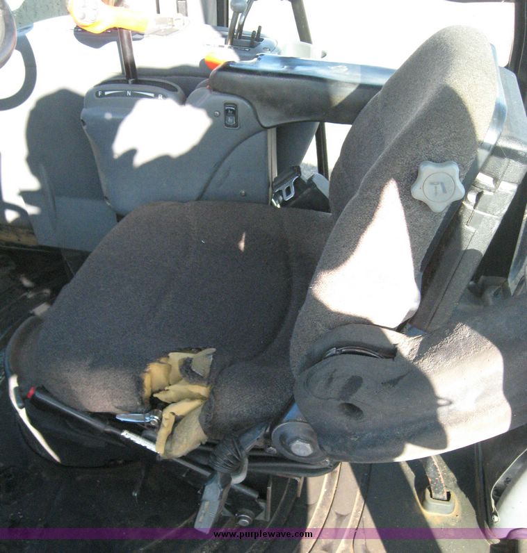 image for item 6611 1998 New Holland TV140 bi-directional 4WD tractor