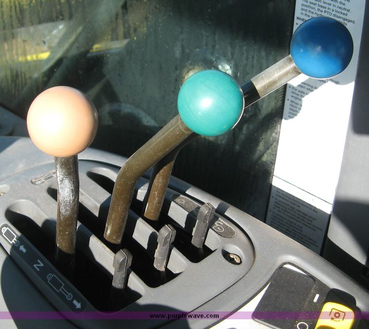 image for item 6611 1998 New Holland TV140 bi-directional 4WD tractor